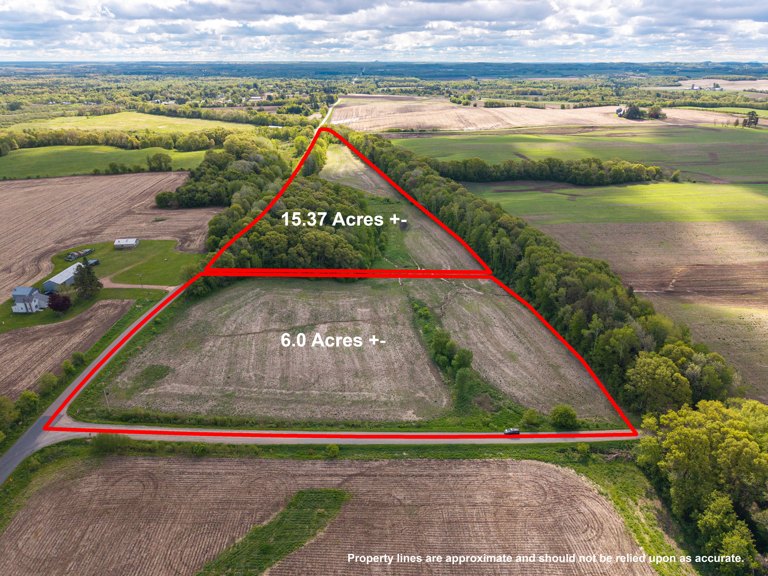 Aerial view of McGower Road property with red boundary lines showing parcels in Fairchild, Wisconsin