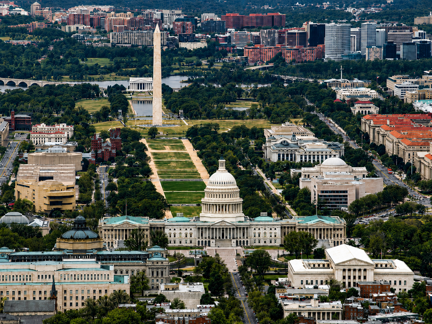 Aerial view of Washington DC showing the Capitol, National Mall, and Washington Monument