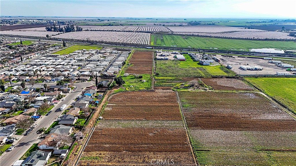 Open field view of the 19.5-acre R-1 residential zoned portion