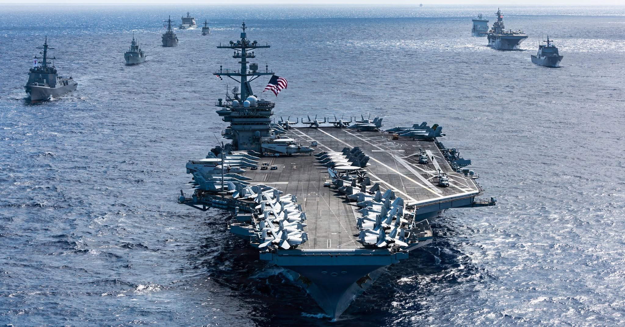 A U.S. Navy carrier strike group at sea during a large multinational exercise
