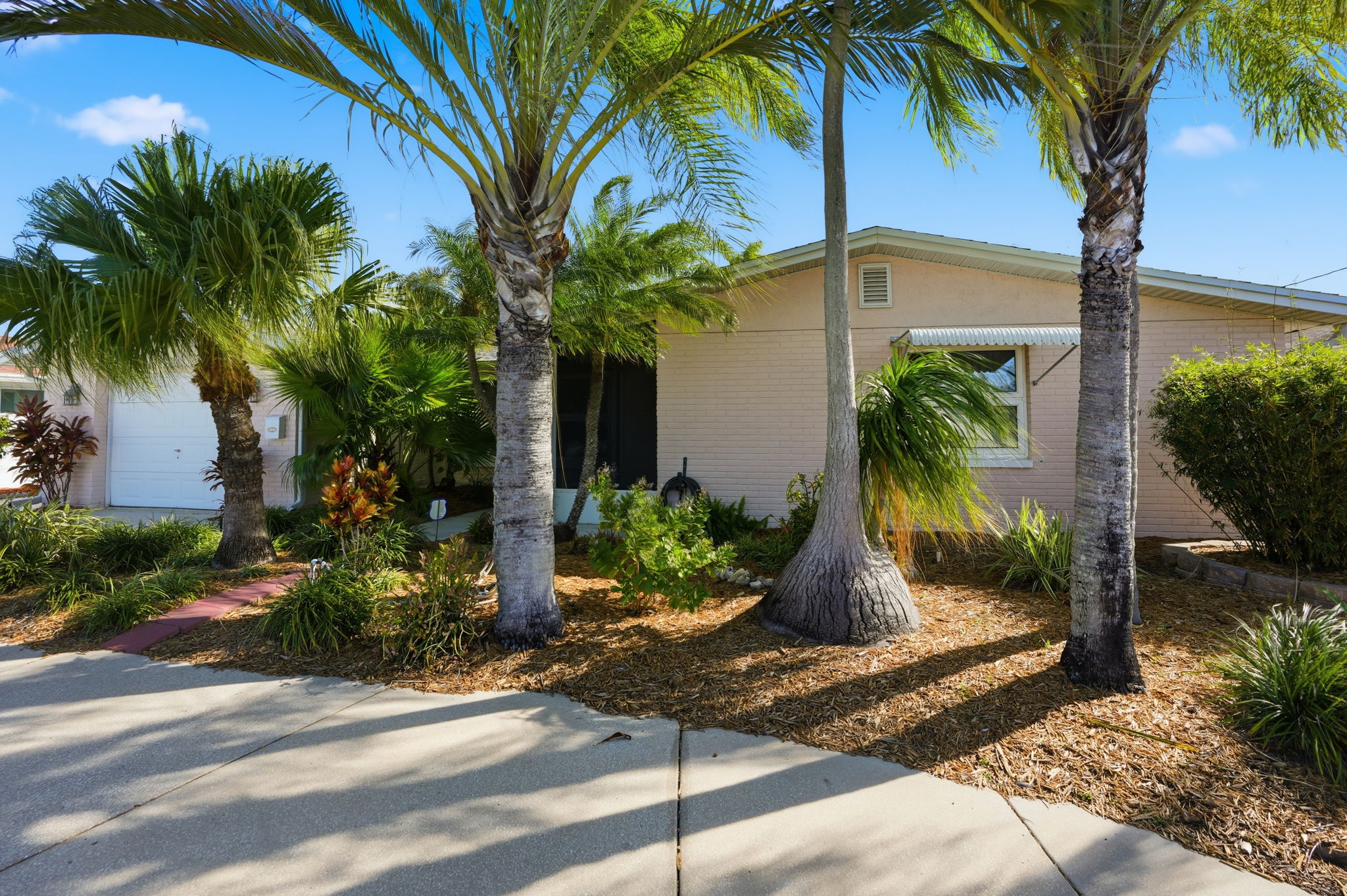 Aerial view of a waterfront Florida home in Kathleen's service area