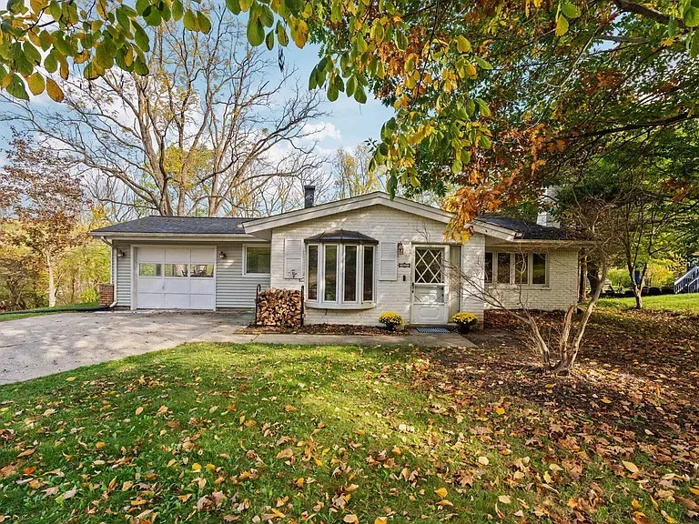 Front view of the 3888 Loch Alpine Dr home in Ann Arbor, a spacious tri-level home on a corner lot