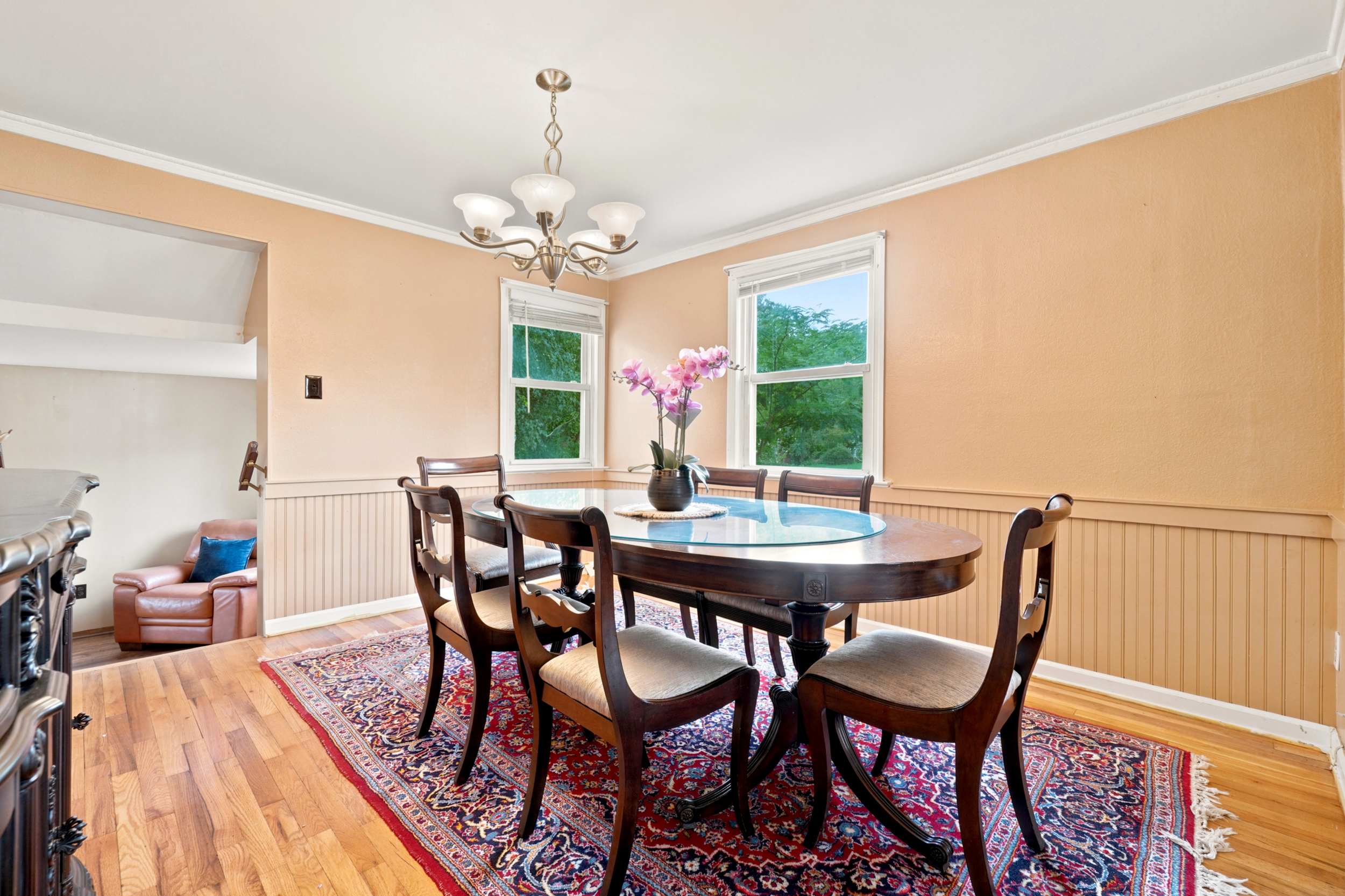 Formal dining room at 50 Heather Ln with windows and wainscoting