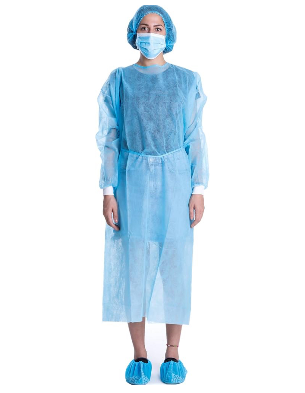 Full personal protective equipment — disposable isolation gown, surgical mask, bouffant cap, and shoe covers — demonstrating proper PPE for dental infection control