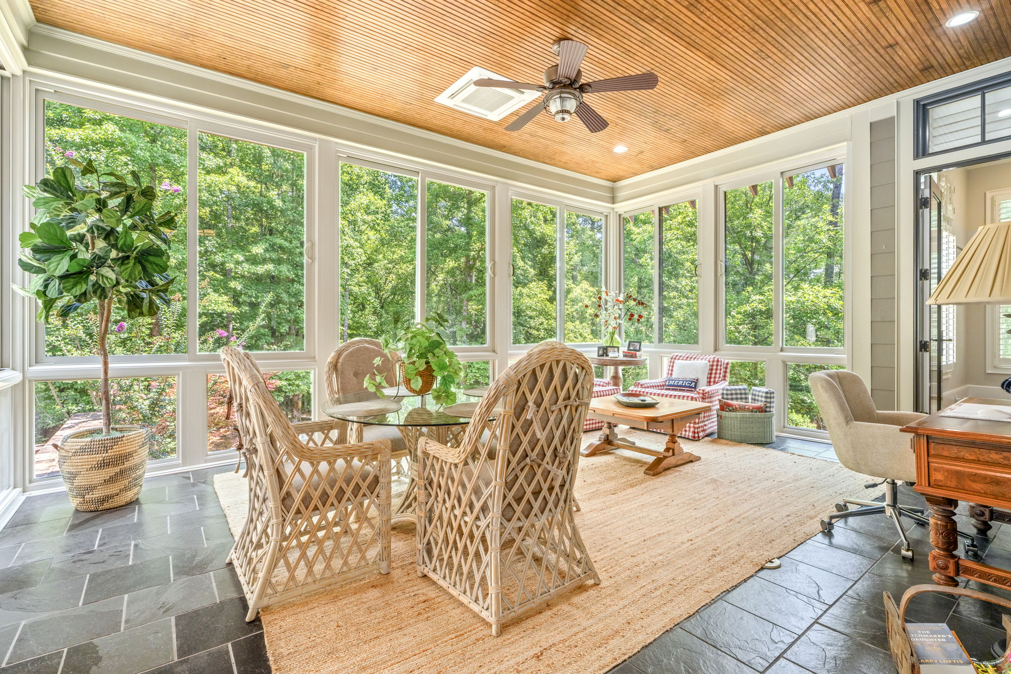 Sunroom with peaceful wooded views