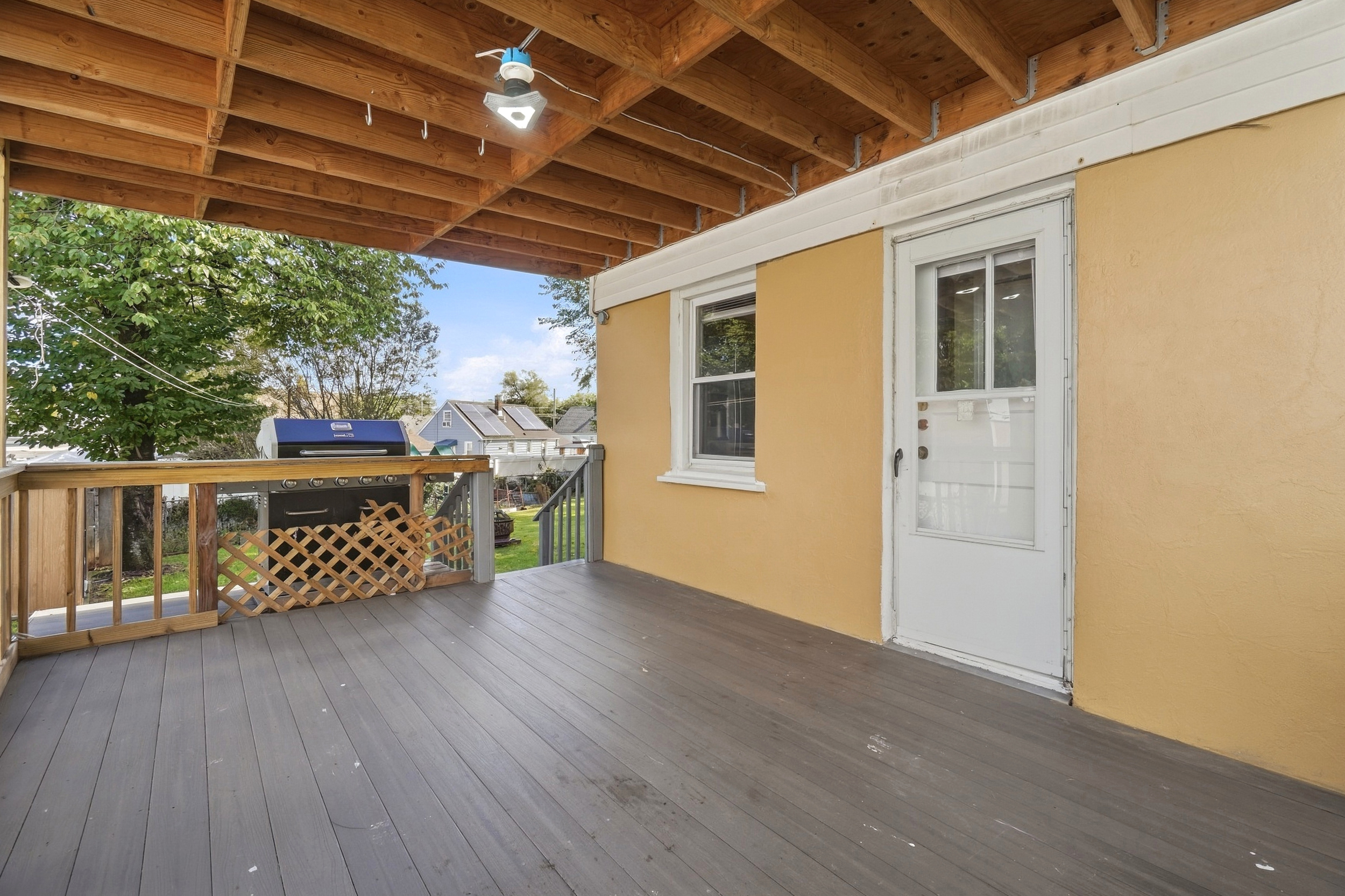 Covered deck at 50 Heather Ln seen from the back door