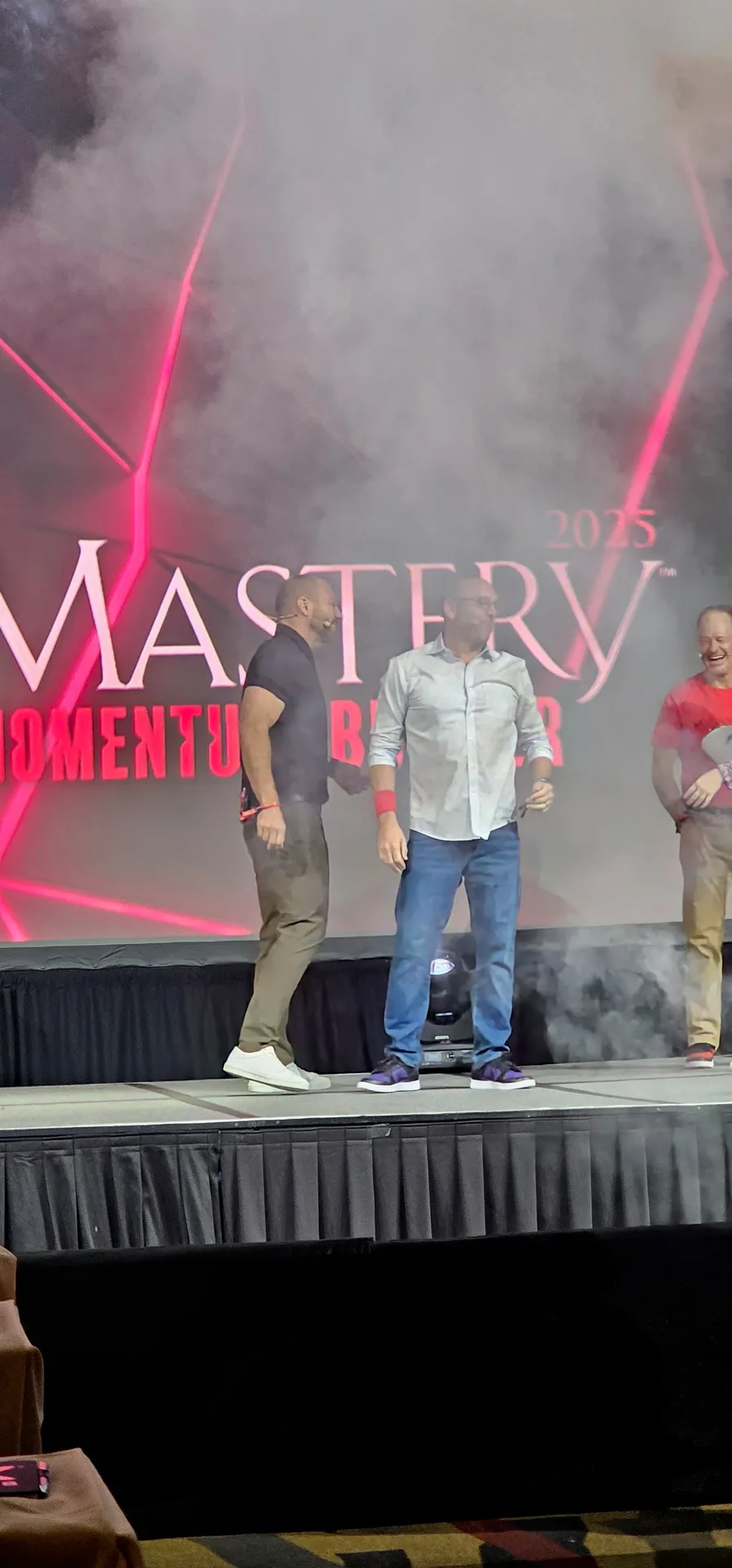 Craig Davis speaking on stage at the Mastery 2025 event