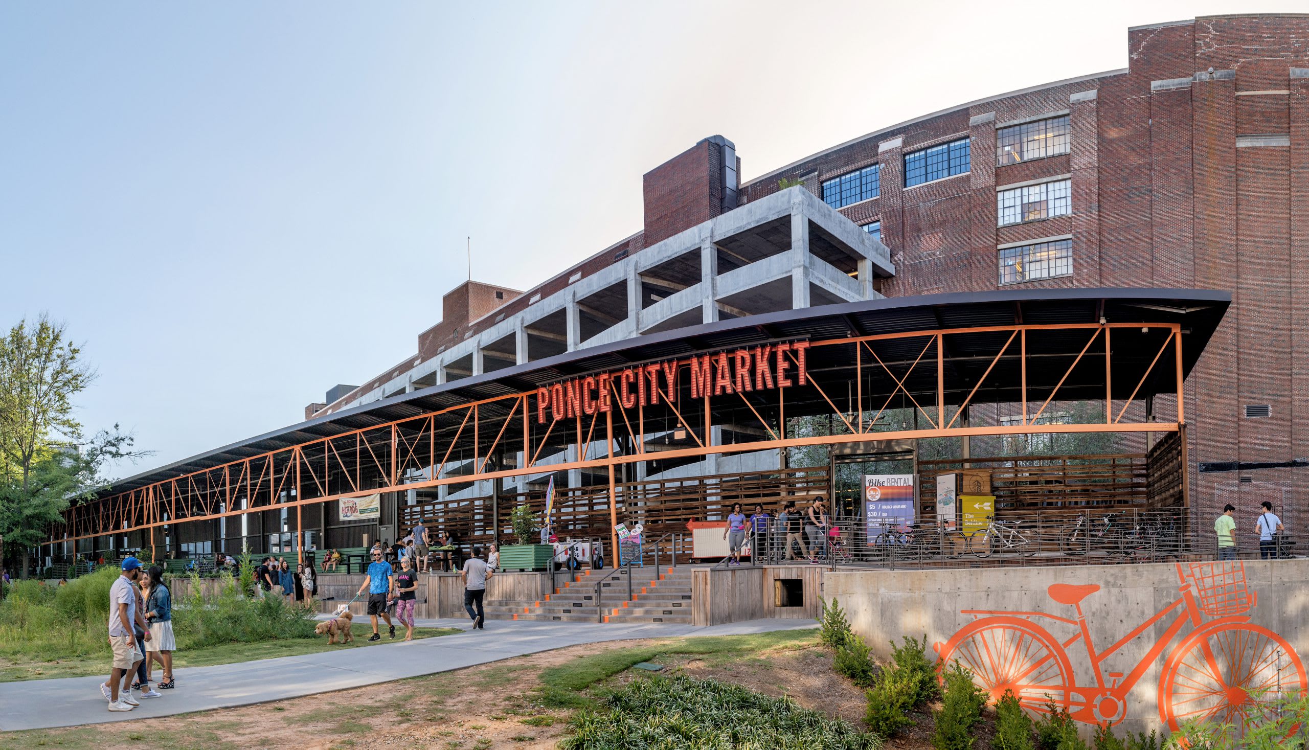 Atlanta Midtown skyline with Ponce City Market and Beltline entrance trail at golden hour