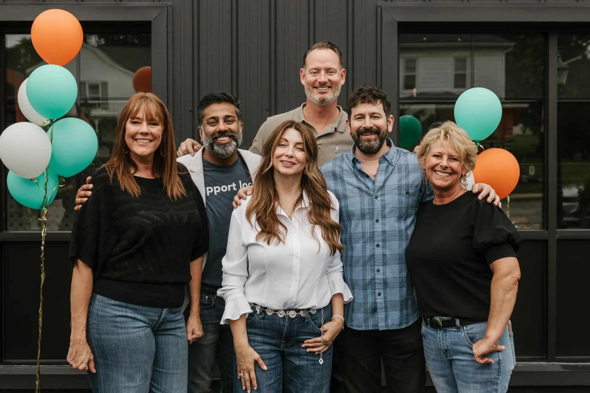 Glasshouse Realty office opening celebration with balloons
