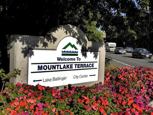 The Welcome to Mountlake Terrace sign with arrows pointing to Lake Ballinger and City Center in Mountlake Terrace, Washington
