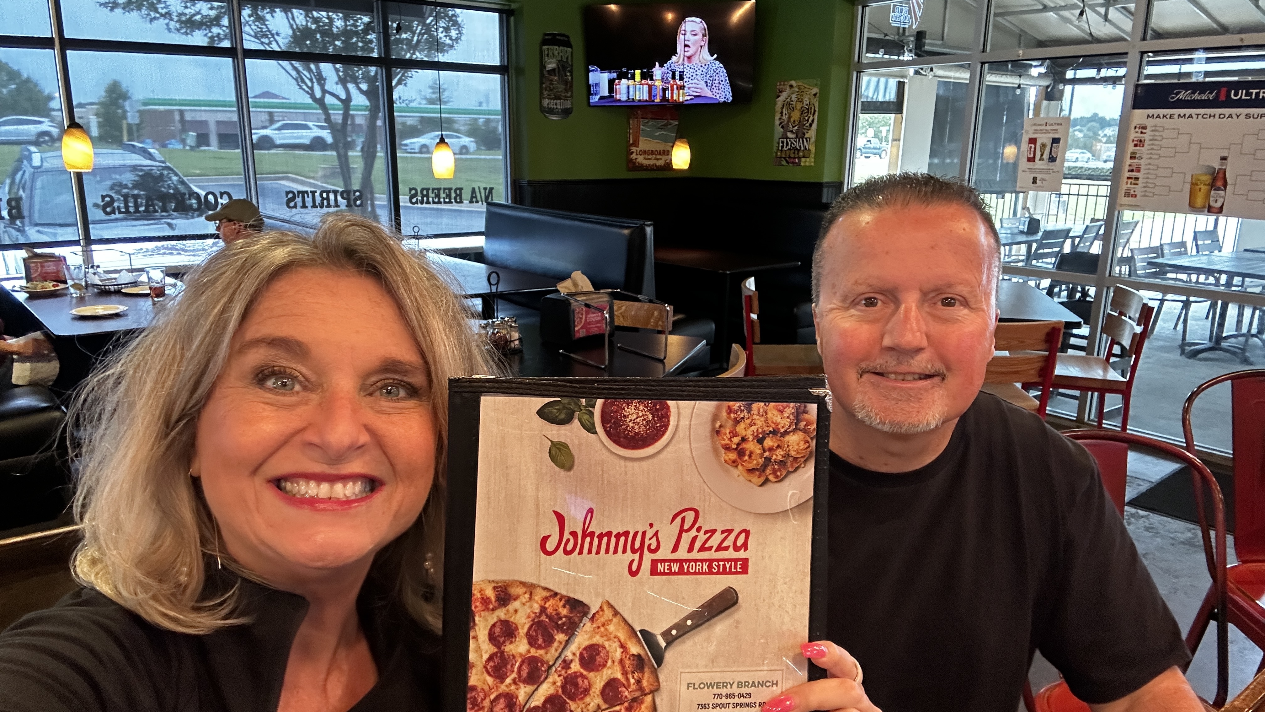 Fresh pizza at Johnny's Pizza Italian restaurant in Flowery Branch Georgia