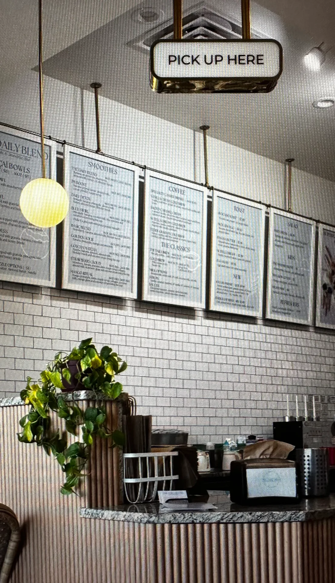 The pickup counter inside The Daily Blend at Lexington Square in Lexington, SC, where açaí bowls, smoothies, and loaded toasts are made to order