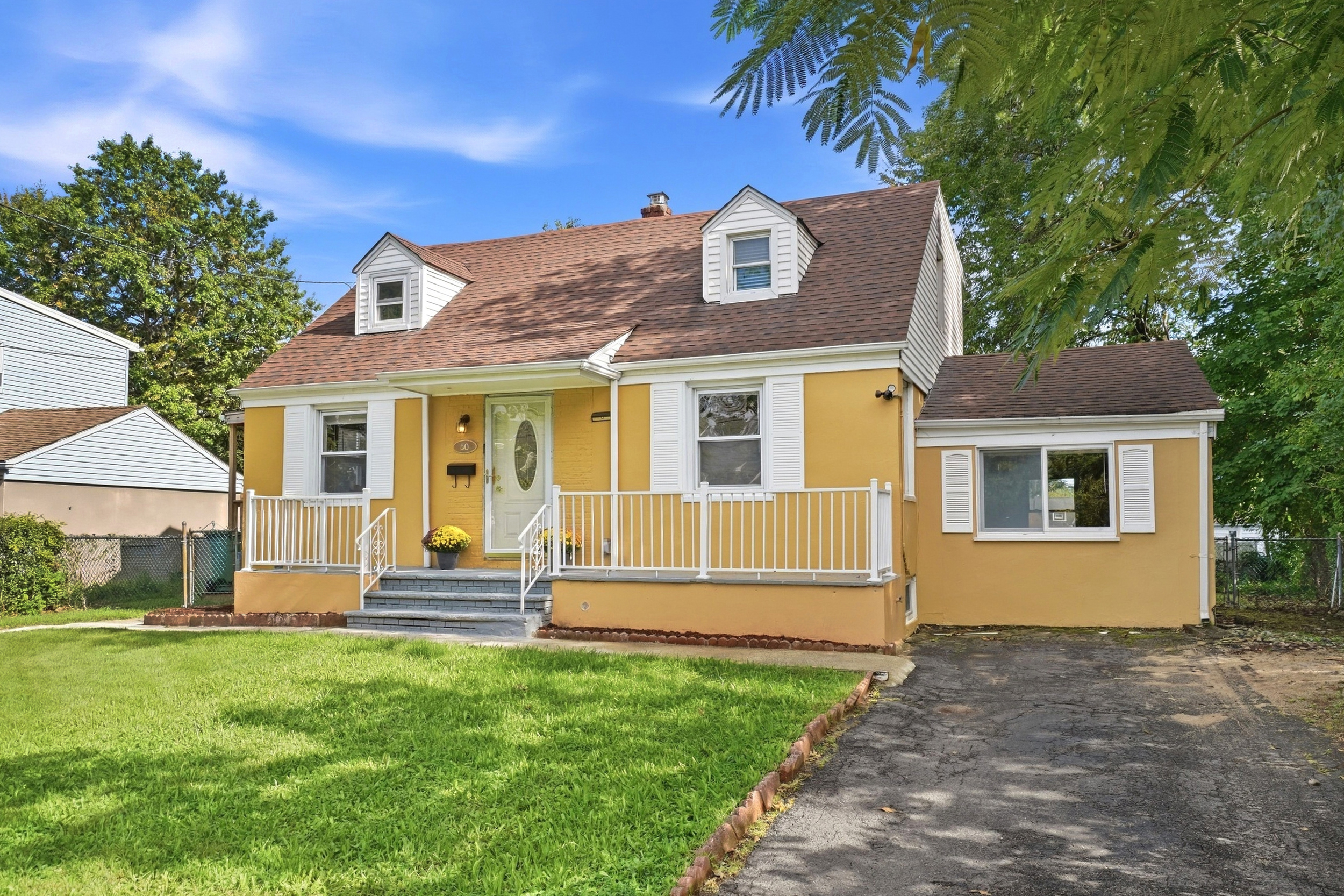 Front exterior of 50 Heather Ln including the driveway