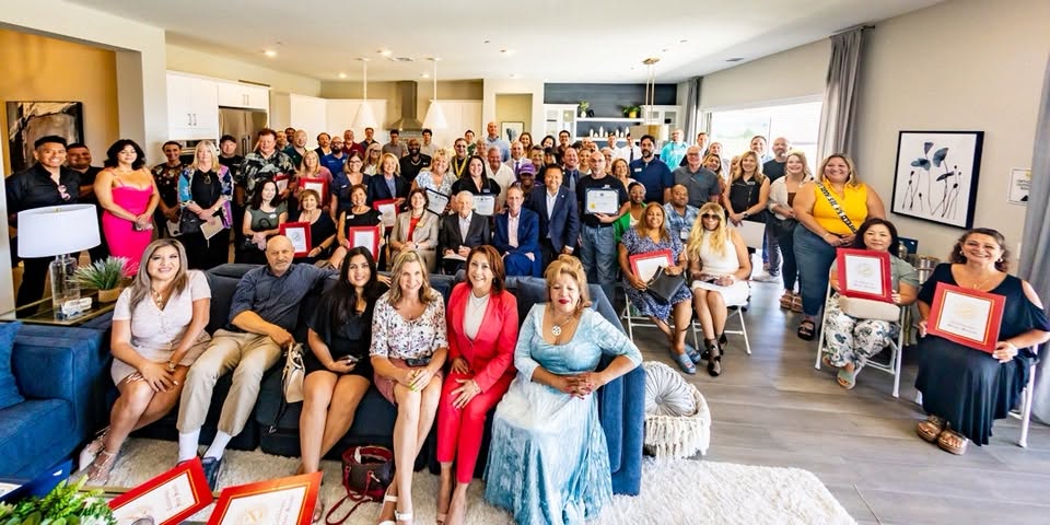 Group photo of real estate professionals at the Exclusive Academy of Real Estate Professionals networking event