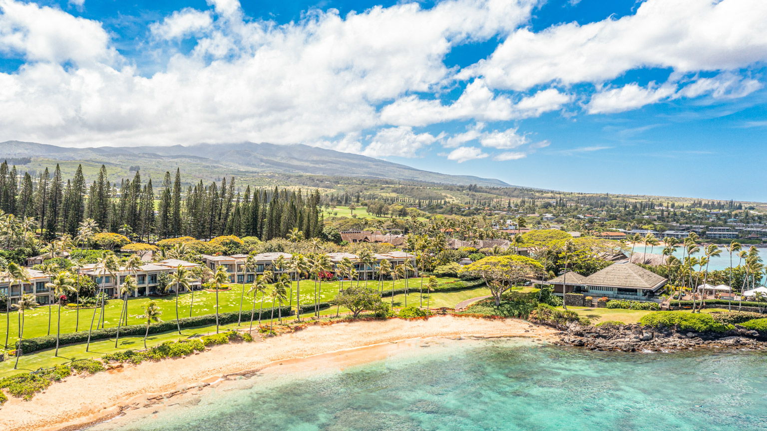 Aerial view of Kapalua coastline and resort community on Maui's northwest shore