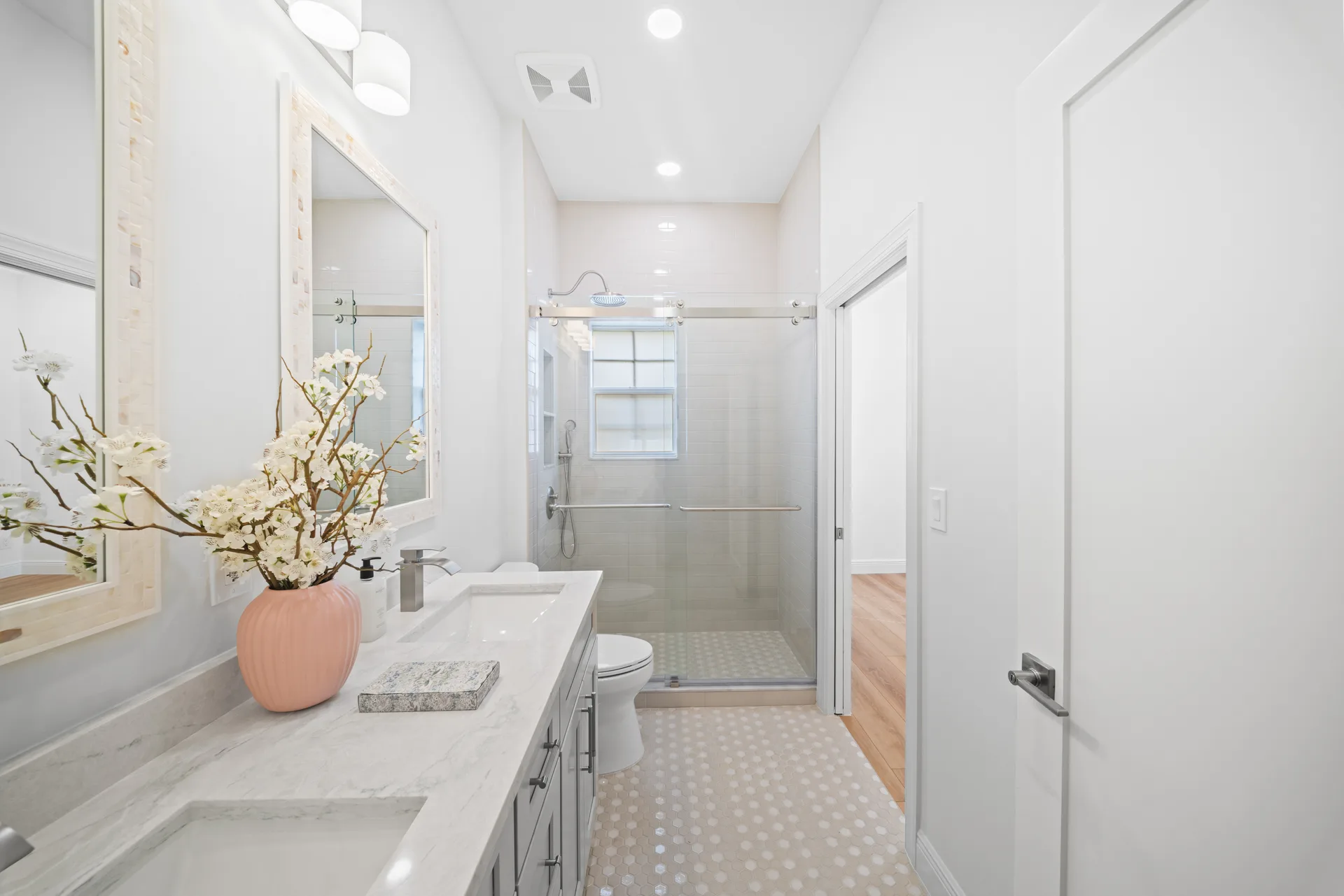 Dual vanity with marble-look countertops