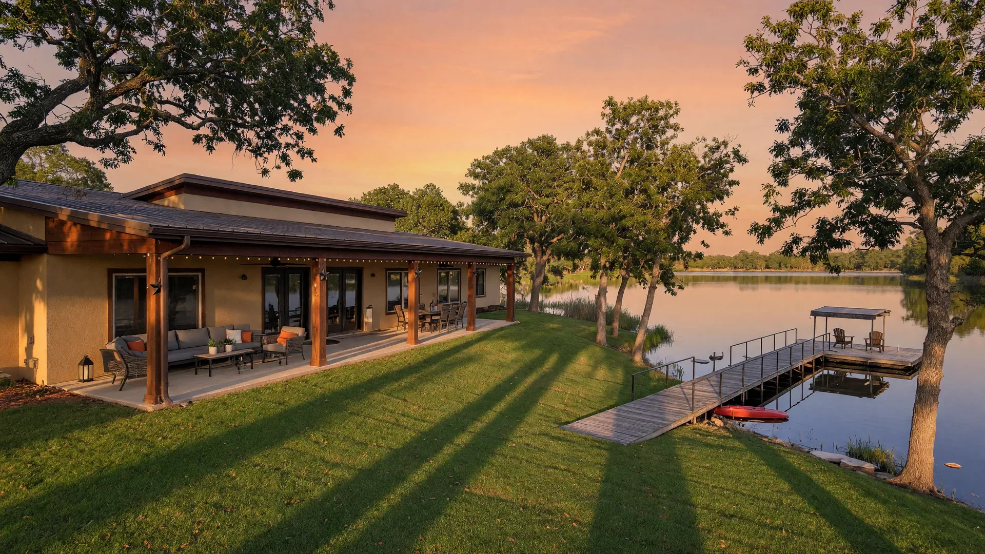 Lakefront home with a private dock at sunset in Northeast Texas