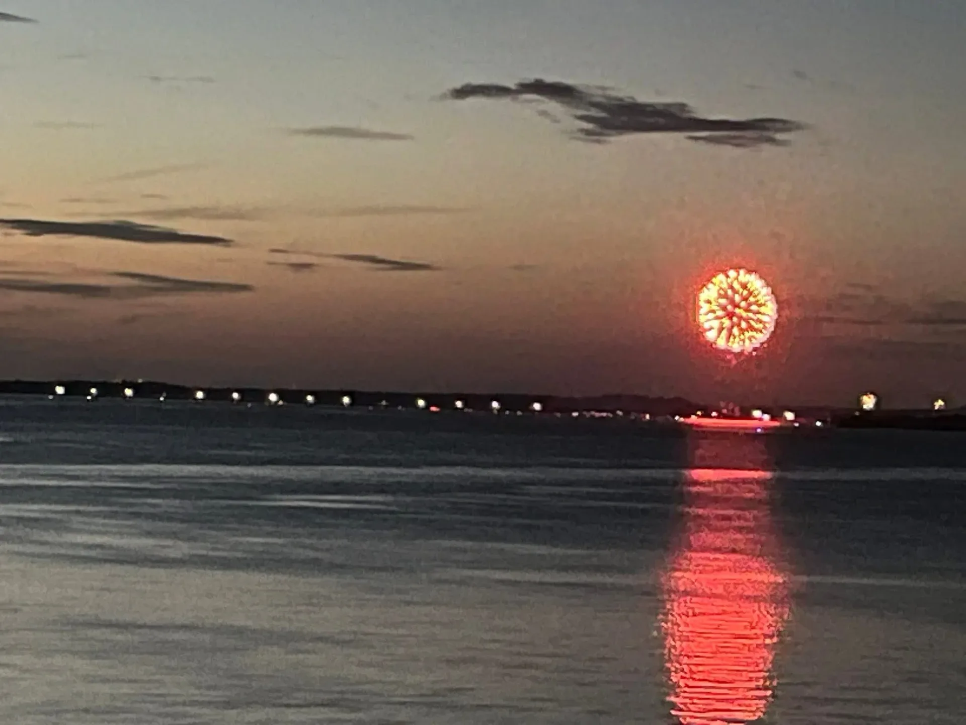 Fireworks over Lake Hudson at twilight