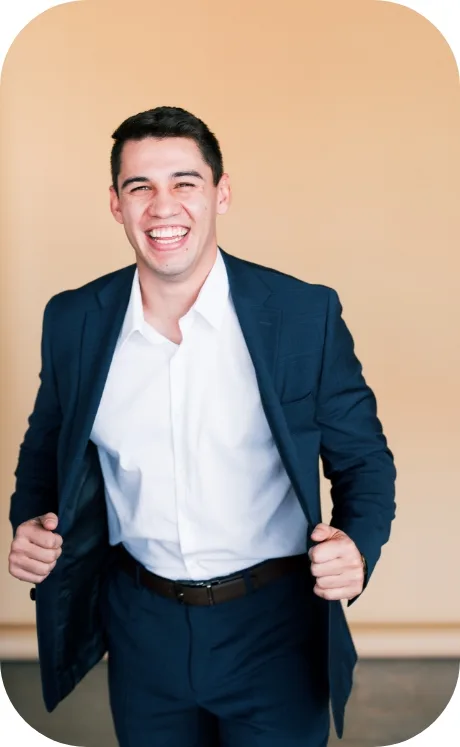 Justin Murillo, REALTOR with Amherst Madison, in a navy suit