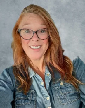 Nancy Wilmeth, Realtor, in a denim button-down shirt