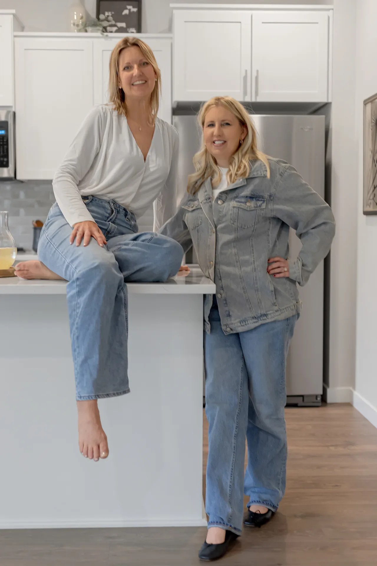 Brenda Brunner and Lani Arms of the Happy Valley Home Team standing together in a bright kitchen