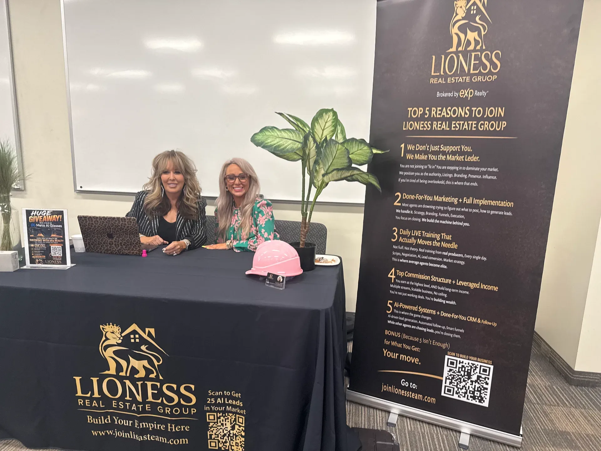 Lisa Copeland and a colleague at the Lioness Real Estate Group recruitment booth