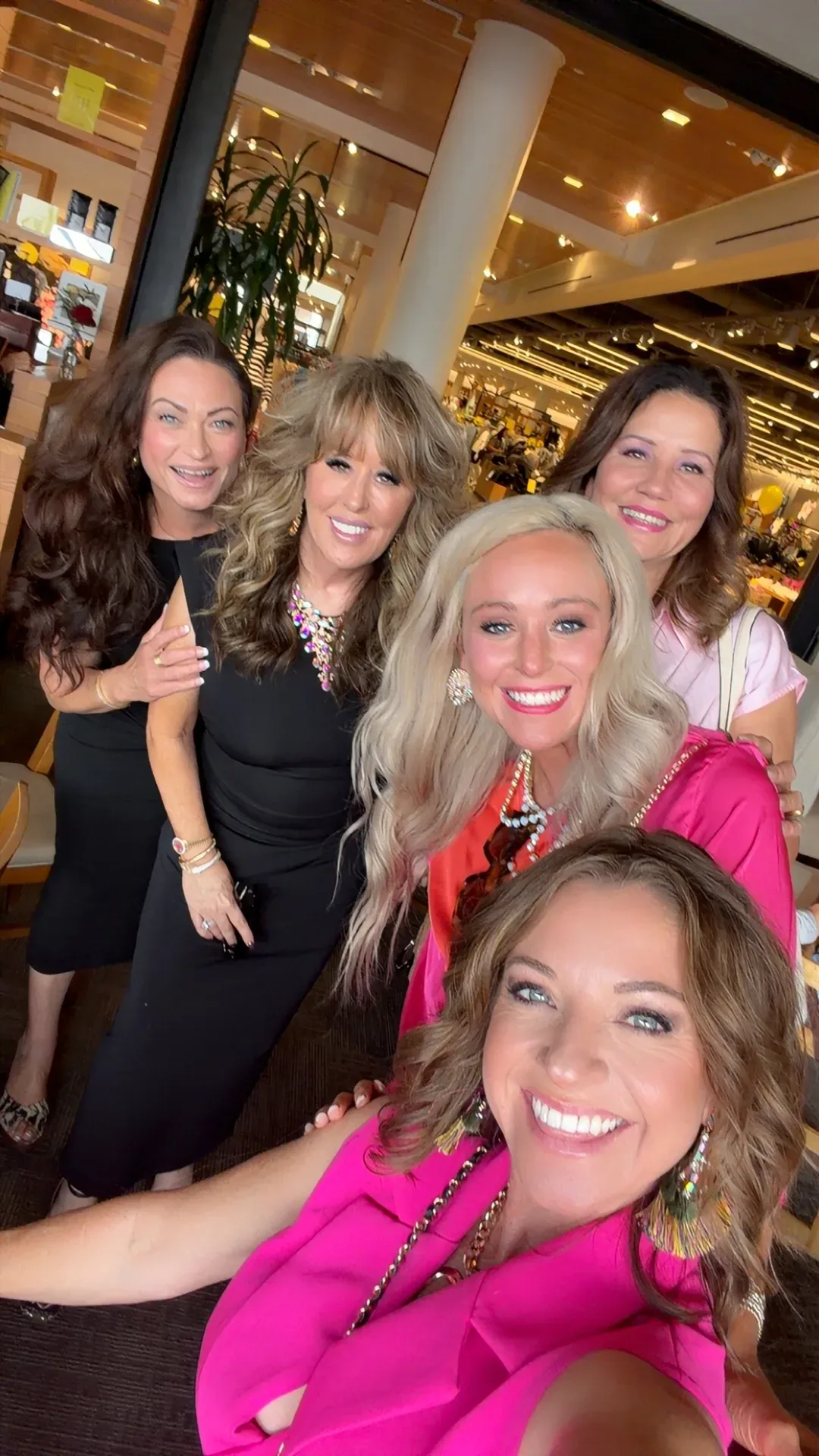 Lisa Copeland taking a selfie with four women at a networking event