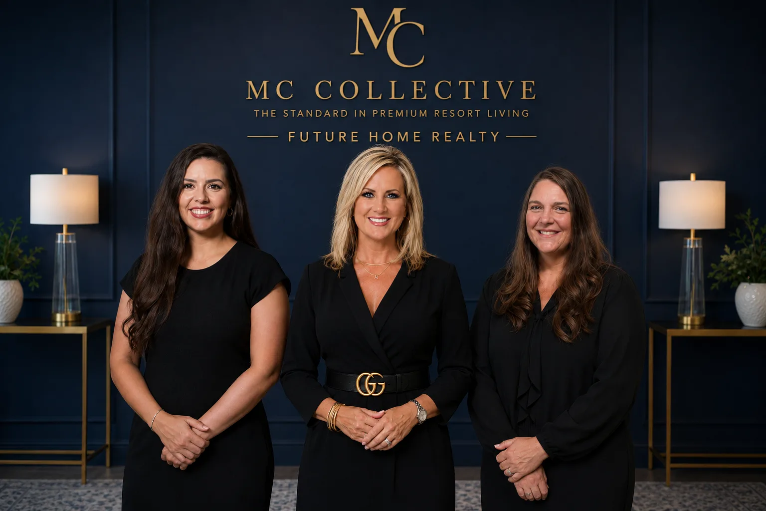 The MC Collective leadership team in front of a branded navy wall