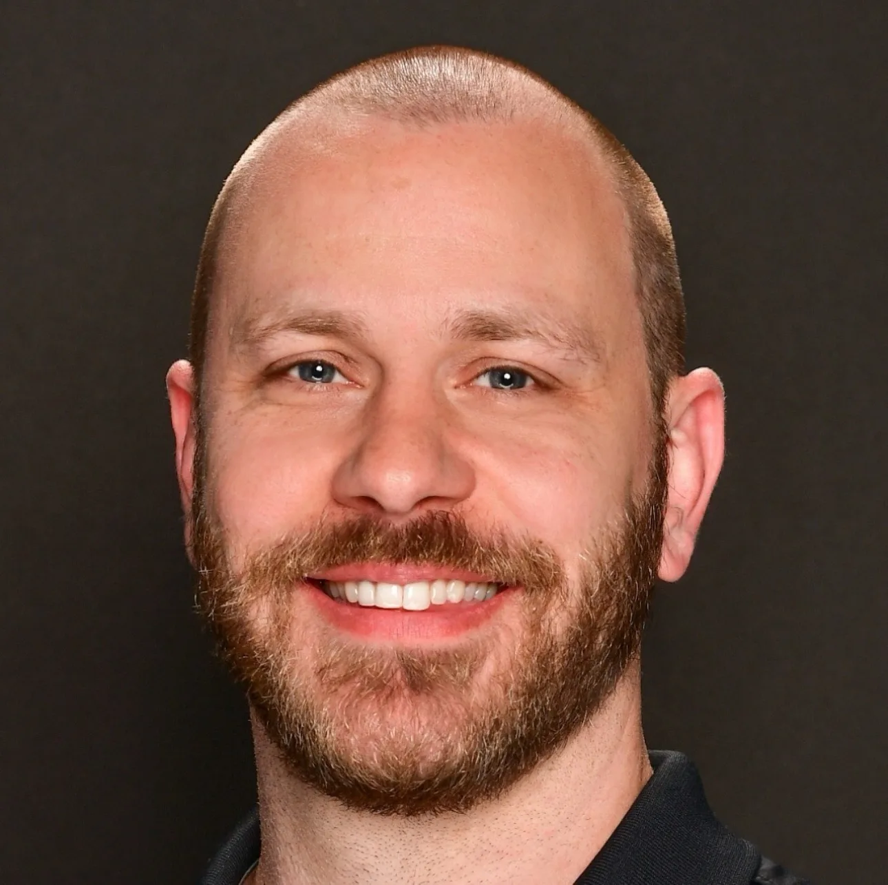 Professional headshot of David Fincher, team lead