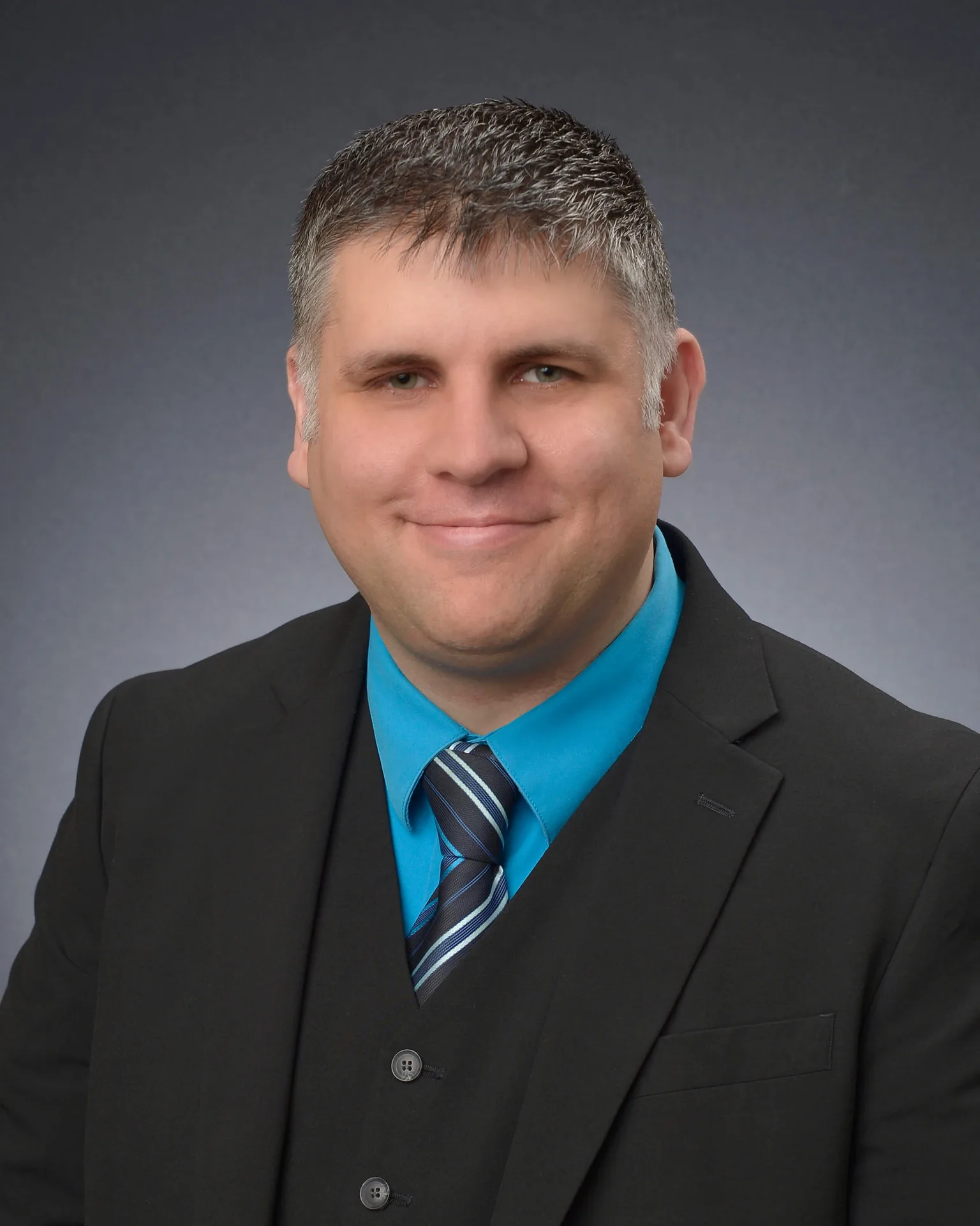 Daniel David, founder of Make Kentucky Home Group at eXp Realty, professional headshot