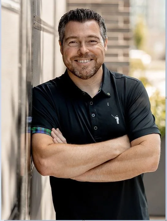 Jeff Naylor, mortgage broker in Camas, Washington, smiling with his arms crossed