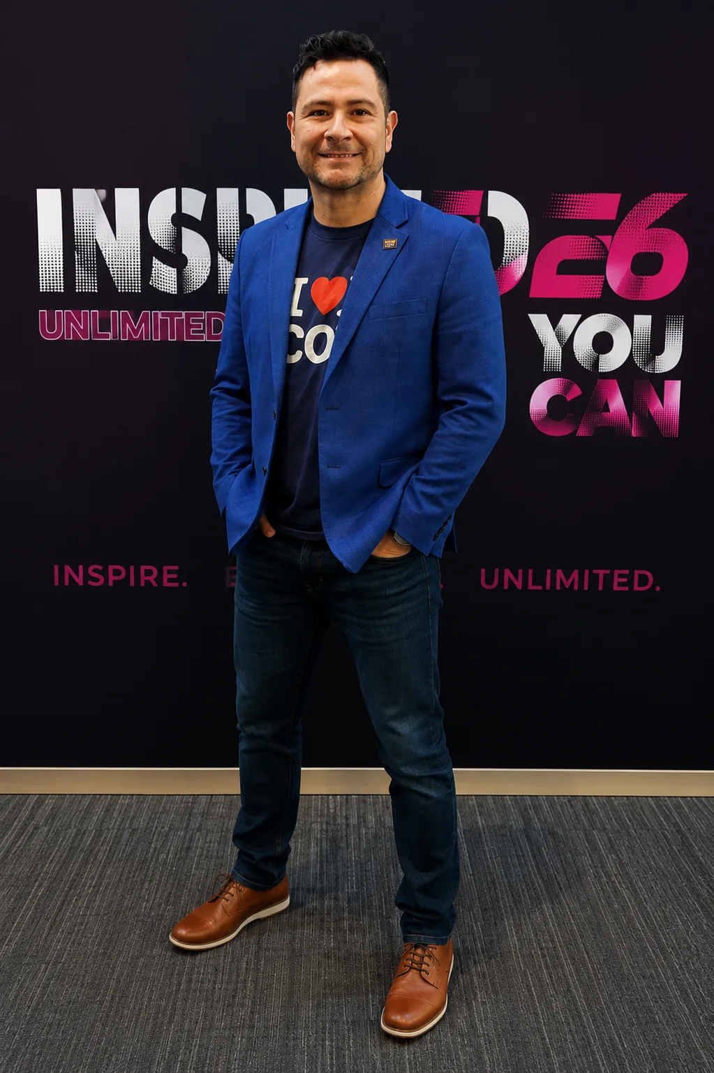 Portrait of Johnny Macias in a blue blazer