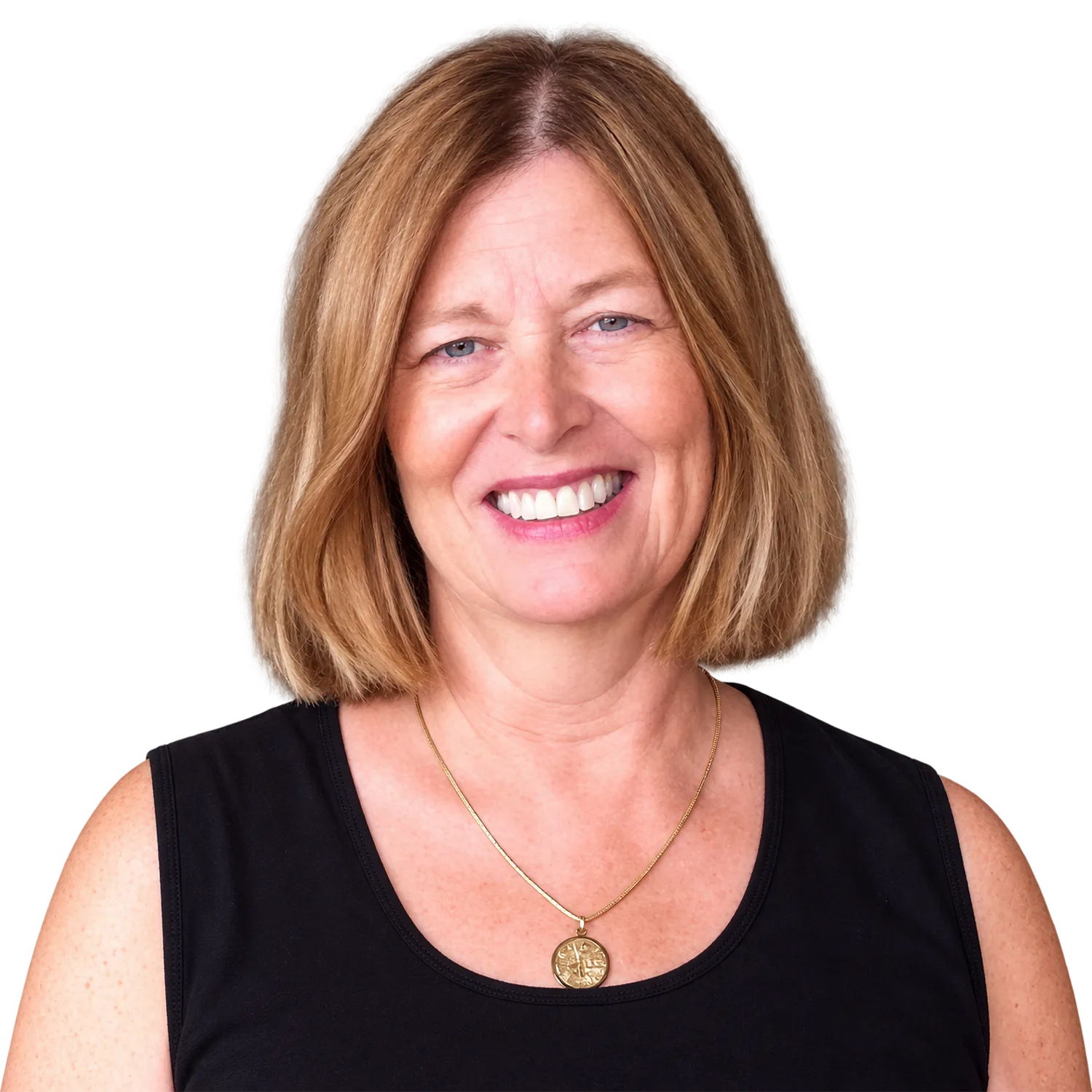 Carol Porter, Realtor® on Hawaiʻi Island, in a black top with a gold pendant necklace