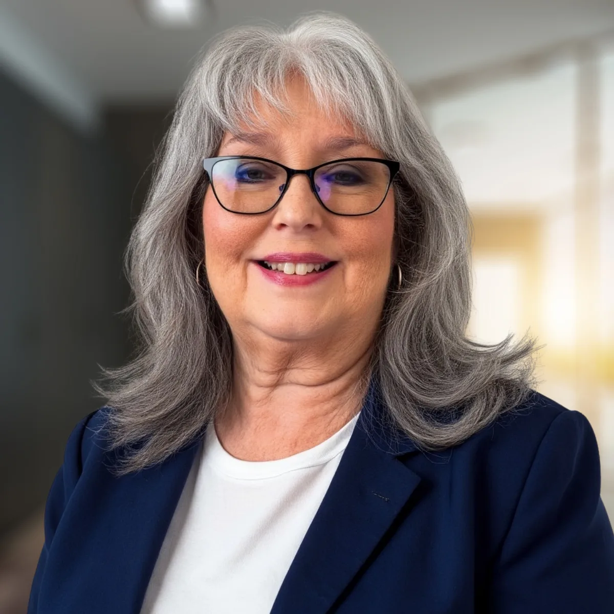 Cathy Ryan, Realtor with eXp Realty of Southern California, in a blue blazer
