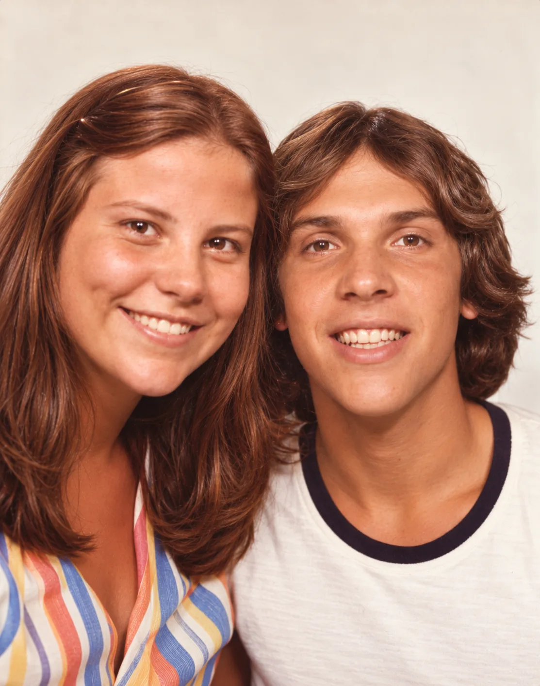 Warm retro photo booth portrait of Kathleen and Joseph