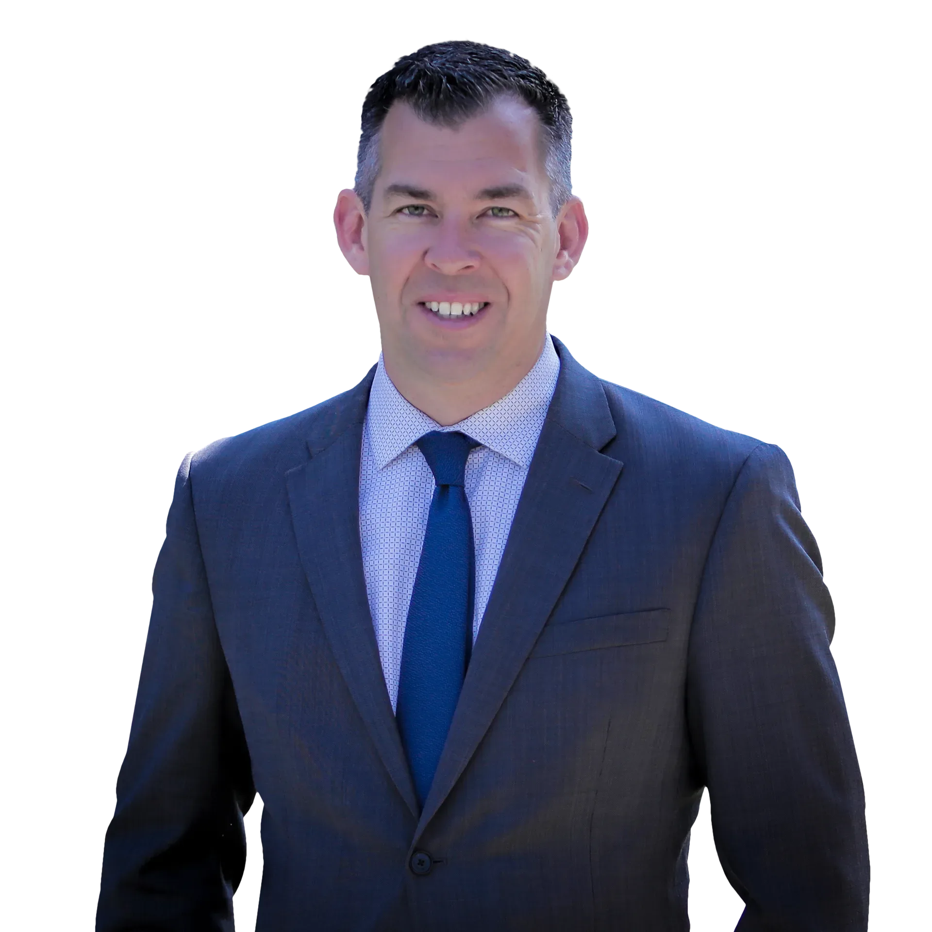 Julian Cesar, licensed Southern California real estate agent with Compass, wearing a dark suit and blue tie