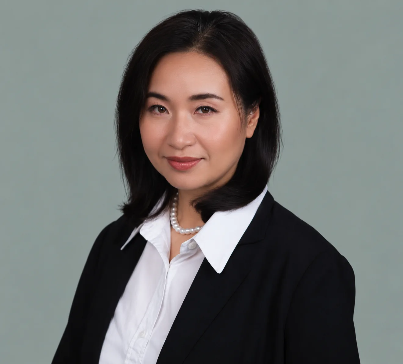 Headshot of Milan, Realtor with NEST Real Estate Group