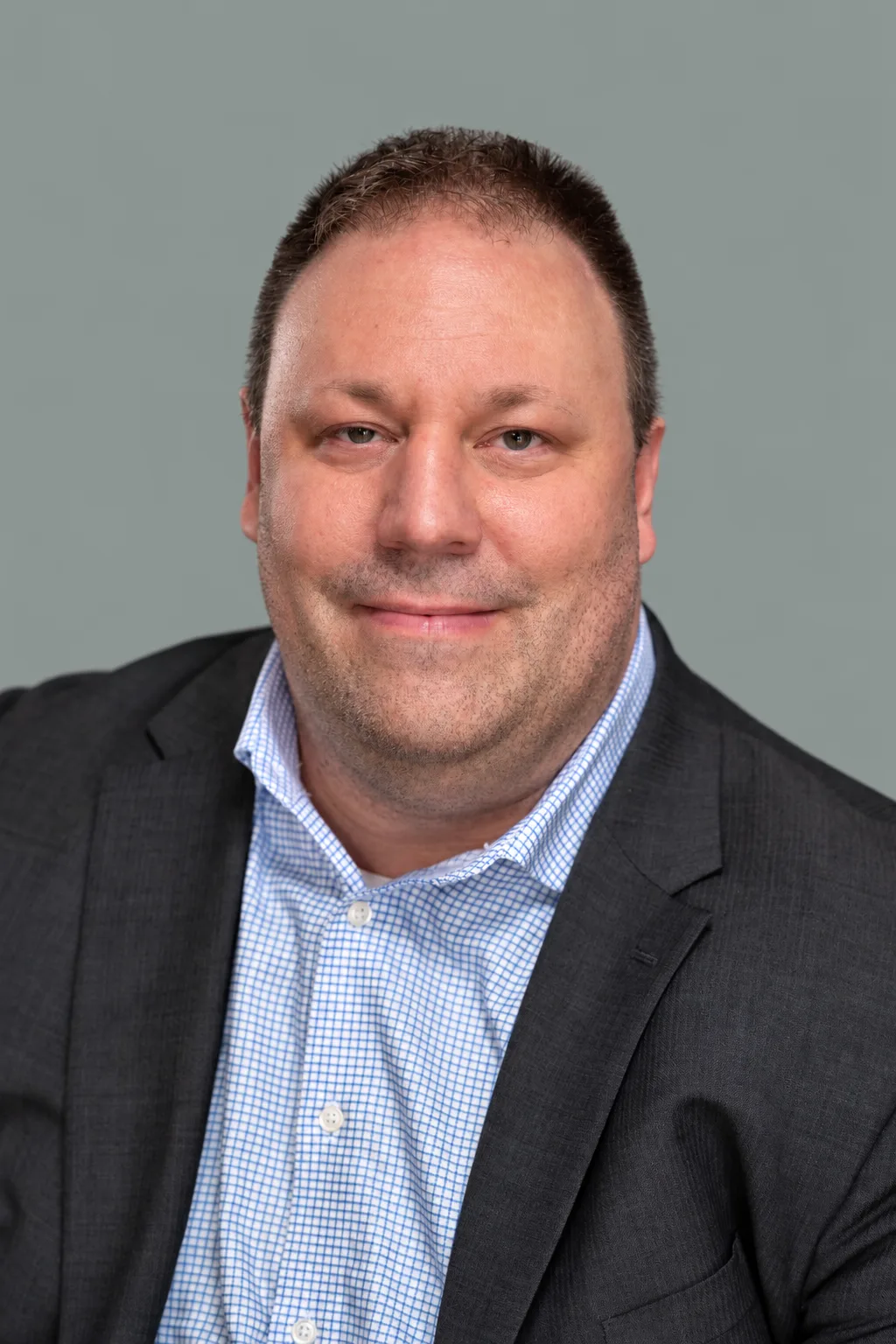 Headshot of Brian, Realtor with NEST Real Estate Group