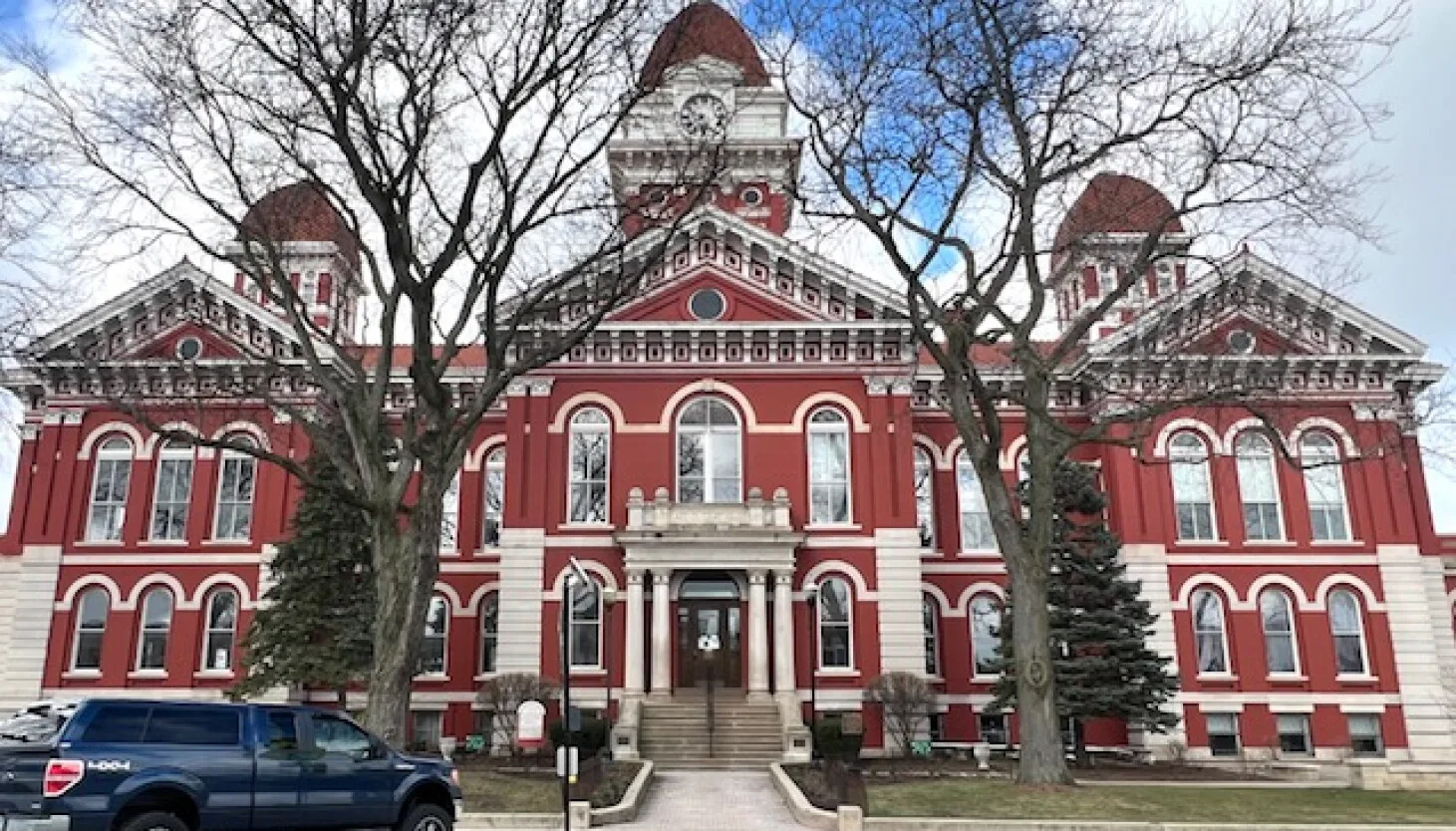 Crown Point's historic red brick courthouse with a clock tower