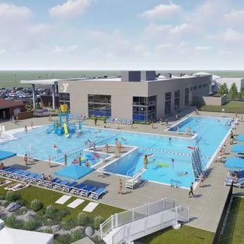 Aerial view of the YMCA with outdoor pools and water slides