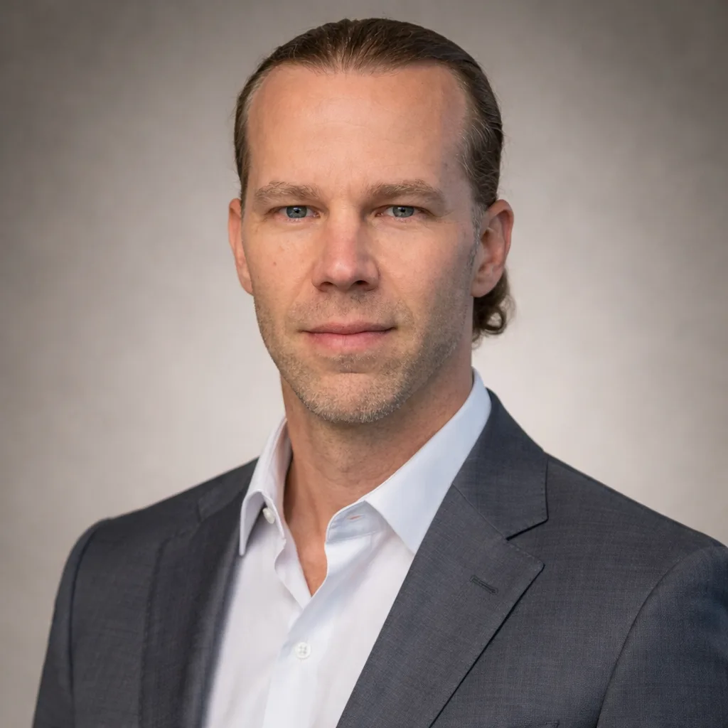 Joe Perkins, managing broker with John L Scott, professional headshot