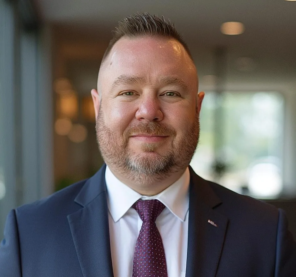 Sean White, St. Louis REALTOR, in a navy blazer