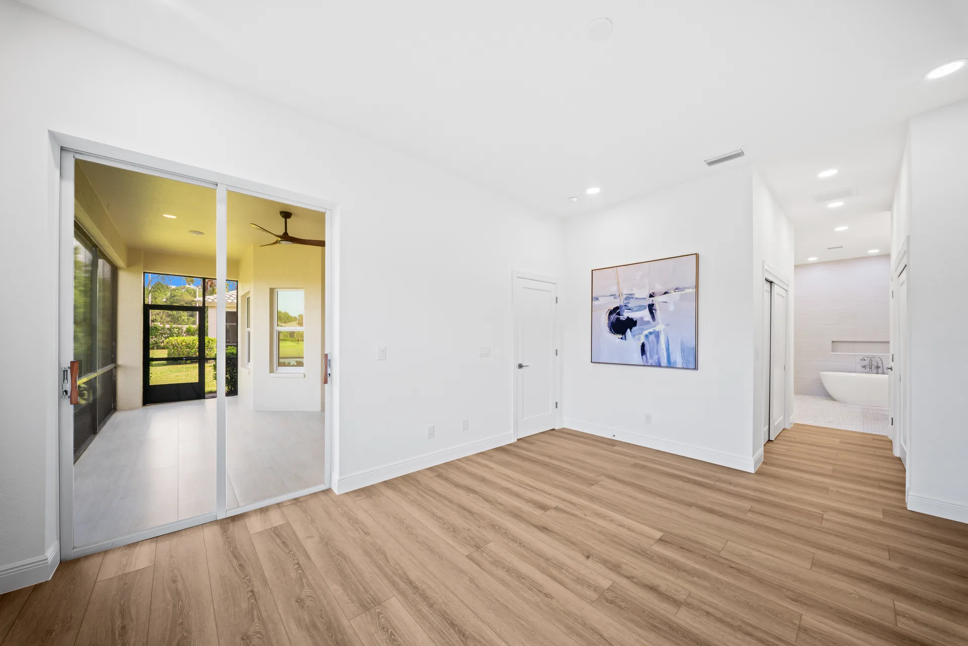 Master bedroom with lanai view and en-suite bathroom