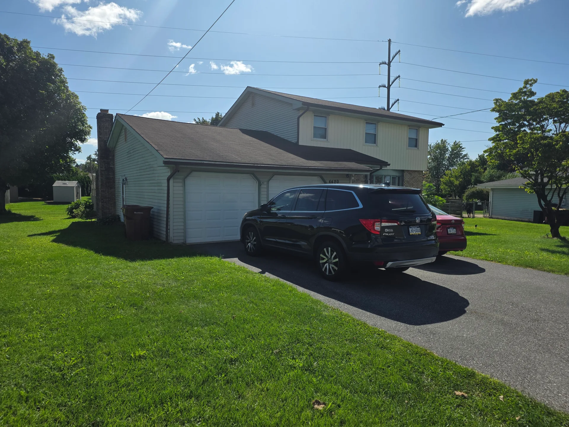 Colonial facade with attached two-car garage