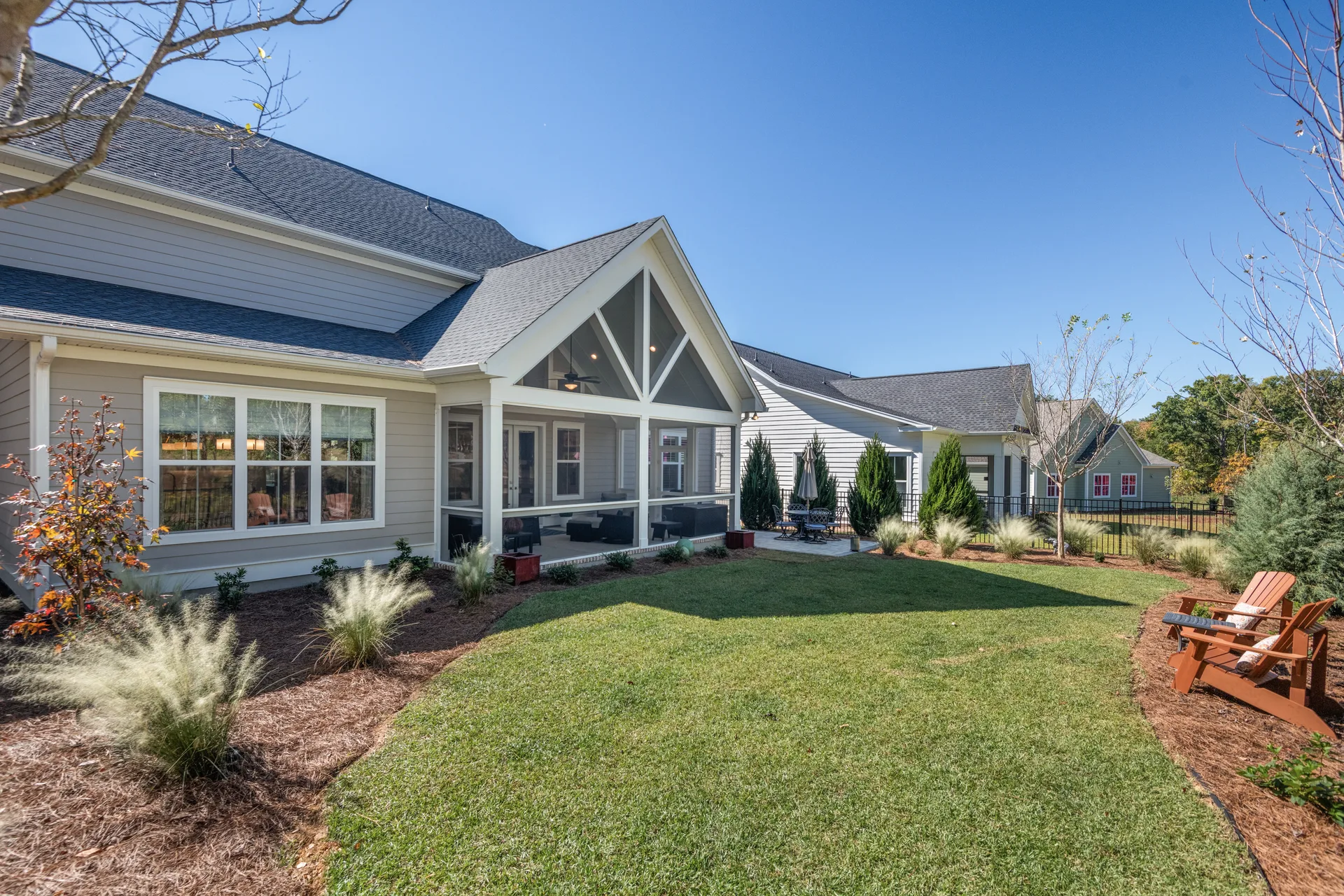 Rear exterior with the vaulted screened porch