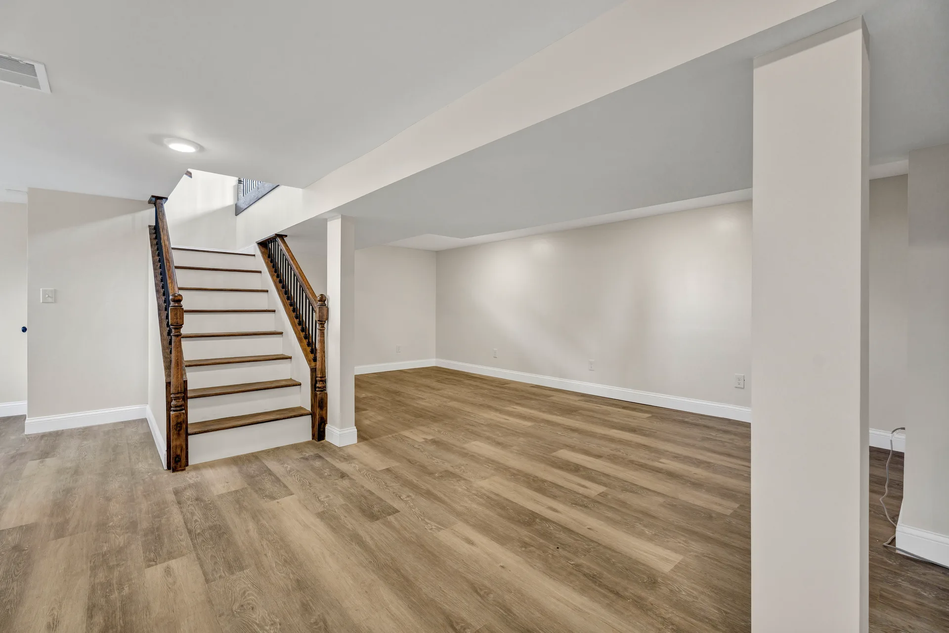 Finished lower level landing with stairs
