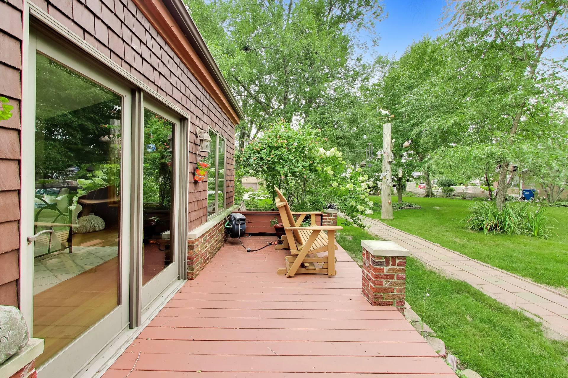 Rear deck with brick pillars and stone caps