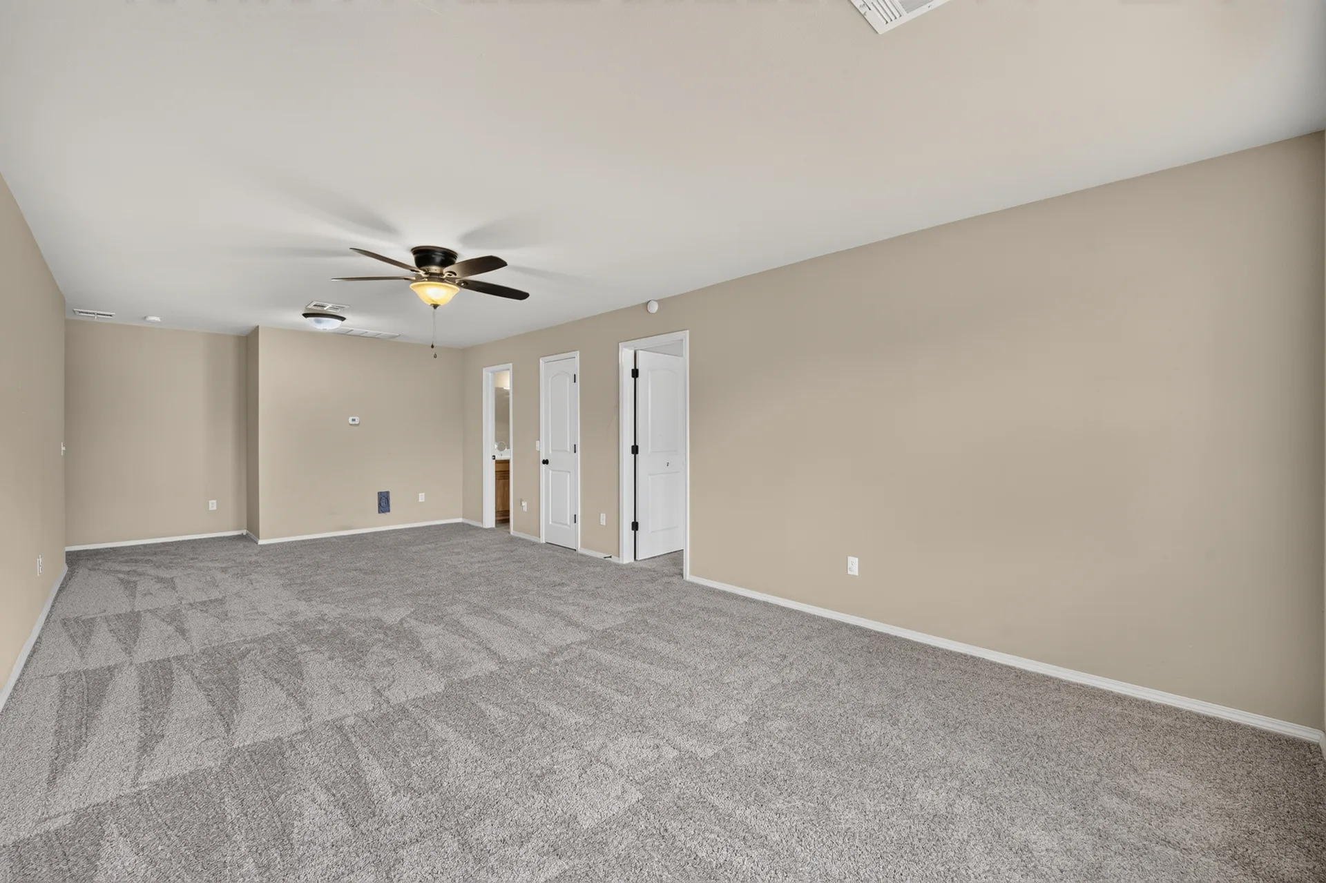 Primary bedroom with new carpet