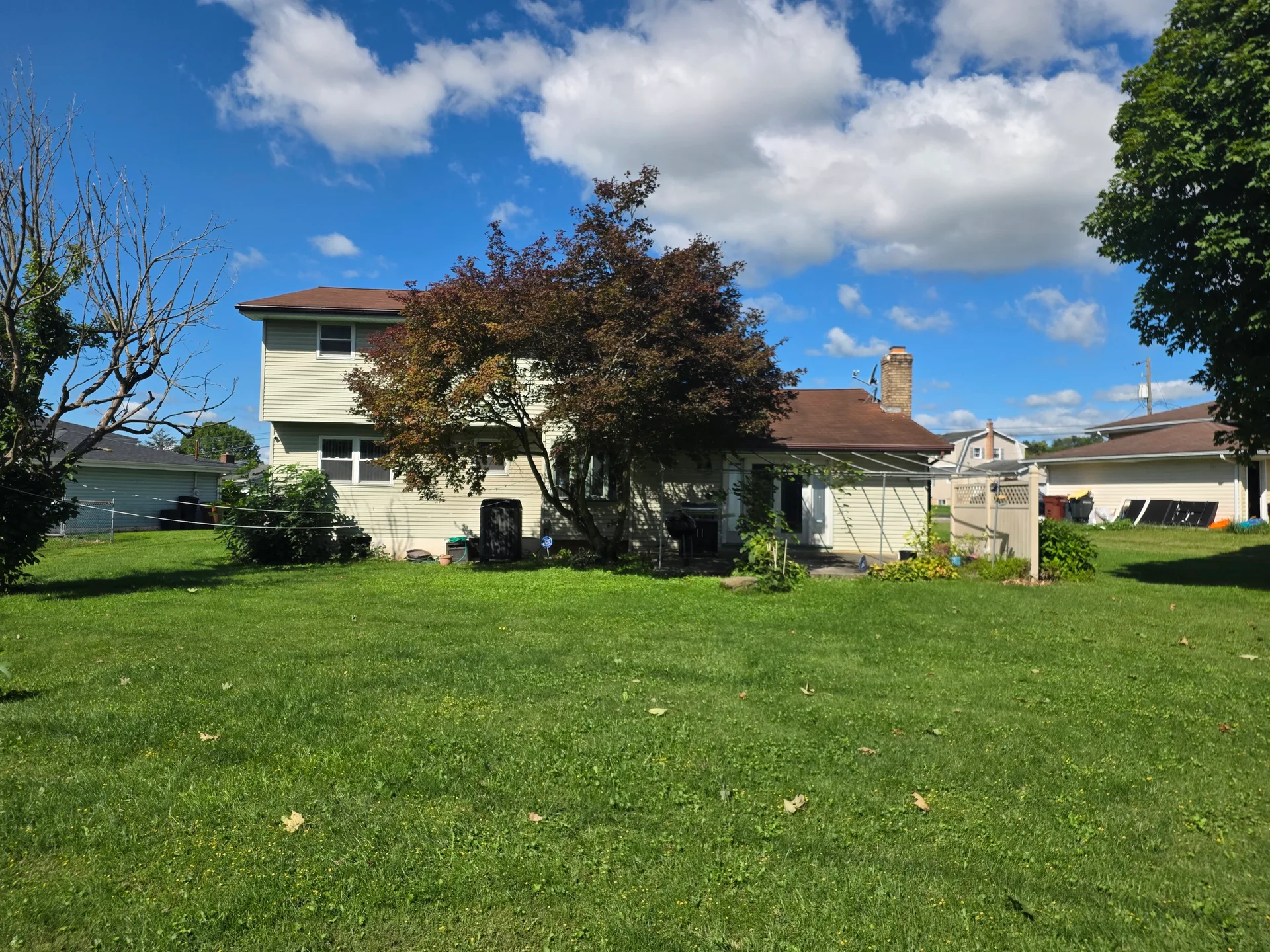 Backyard and rear of the Colonial home